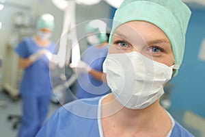 Portrait female surgeon wearing surgical mask in hospital