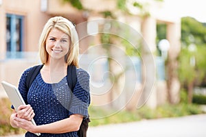 Portrait Of Female University Student Outdoors On Campus