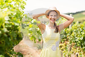 Portrait of female vintner in hat