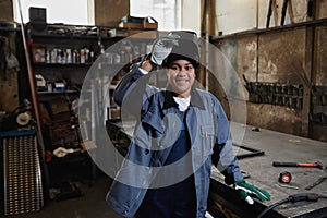 Portrait Of Female Welder In Workshop