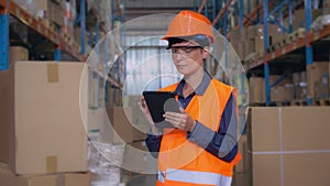 Portrait female at work in storehouse.