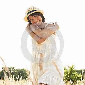 Portrait, field and woman with self love, hug and summer with happiness, sunshine and relax. Person, outdoor and girl