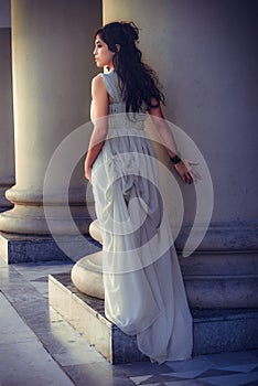 The fine young girl with a light dress. Romance style