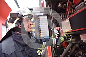 portrait of a firefighter in the operations centre at the fire-fighting vehicle