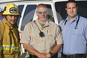 Portrait Of Firefighter, Traffic Cop And EMT Doctor