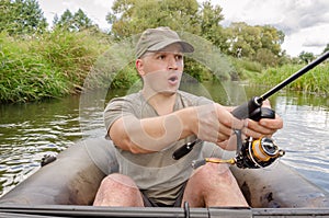 Portrait of a fisherman with a surprised face