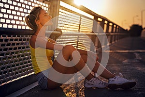 Portrait of fit sporty young woman in city. People sport exercise urban healthy lifestyle concept