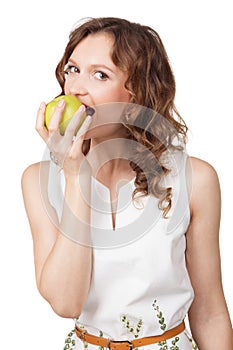 Portrait of fit young girl biting a fresh ripe apple