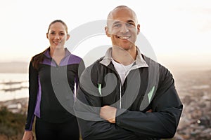 Portrait, fitness and couple in nature with arms crossed for training, exercise or morning cardio run. Sports, face and