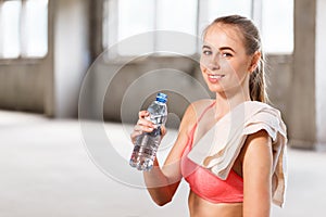 Portrait Of Fitness Girl Drinking Water