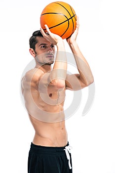 Portrait of a fitness man playing in basketball