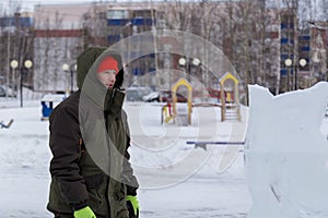 Portrait of a fitter in a green jacket