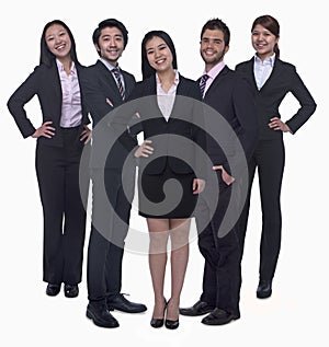 Portrait of five young smiling businesswomen and young businessmen, looking at camera, studio shot