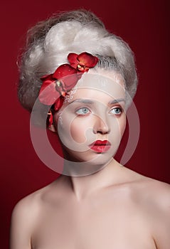 Portrait with flowers in her hair.