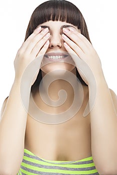 Portrait fo Young woman Closing Her Eyes with Hands