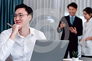 Portrait of focus successful confident male manager in harmony office.