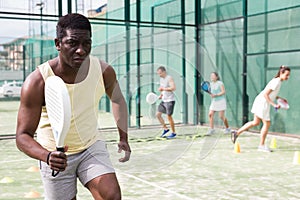 Portrait of focused man during padel training