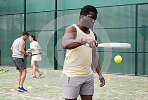 Portrait of focused man during padel training