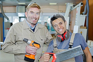 portrait foreman and apprentice tradesman