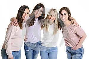 Portrait Of Four best friends Women In Studio Standing