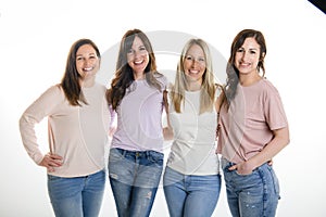 Portrait Of Four best friends Women In Studio Standing