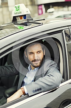 Portrait of French Parisian taxi driver