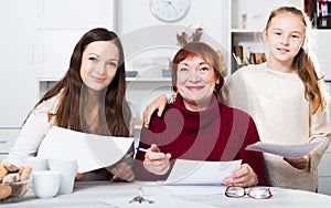 Happy family working with papers