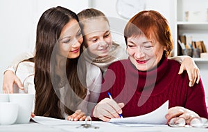 Happy family working with papers