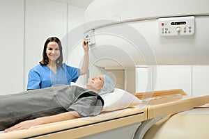 Portrait Of Friendly Successful Doctor Smiling At Camera During Mri
