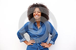 Friendly woman smiling on isolated white background photo