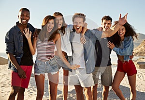 Portrait Of Friends Having Fun Together On Beach Vacation