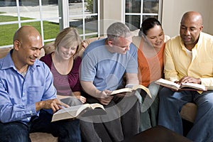 Portrait Of Friends At Home Bible Study