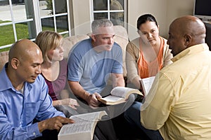 Portrait Of Friends At Home Bible Study