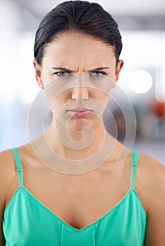 Portrait, frown and angry with woman, stress and emotions with expression and frustrated. Face, person and girl with