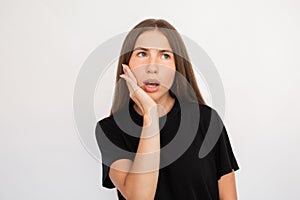 Portrait of frowning young woman looking away