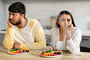 Portrait of frustrated young indian man and woman have quarrel