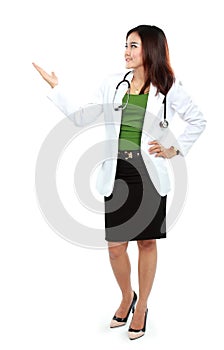 Portrait of full body female doctor showing blank area