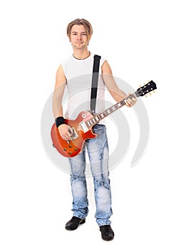 Portrait in full growth.a young guy with a guitar