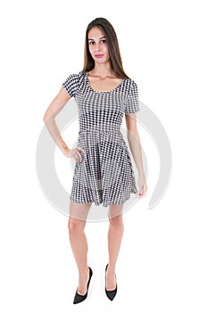 Full lenght of beautiful girl model in casual summer dress on white background