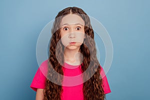 Portrait of funky adorable sweet lovely girl inflate cheeks on blue background