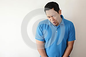 Funny Asian Man Crying When Peeing photo