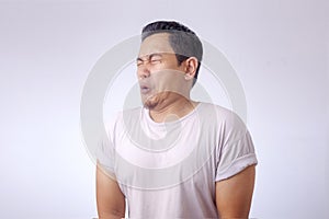 Funny Asian Man Crying When Peeing photo