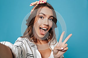 Portrait of funny beautiful woman 20s wearing headband smiling a