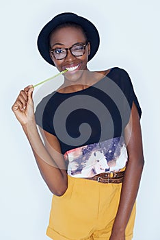 Portrait, funny and black woman with fashion, silly and stylish clothes on a white studio background. African person