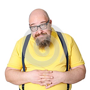 Portrait of a funny charming middle-aged man in a bright yellow