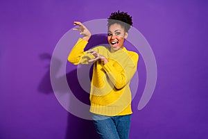 Portrait of funny funky person people acting like wild animal wear denim jeans isolated over purple background