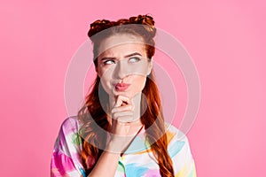 Portrait of funny gorgeous woman with foxy hairstyle wear print shirt tricky look at promo empty space isolated on pink