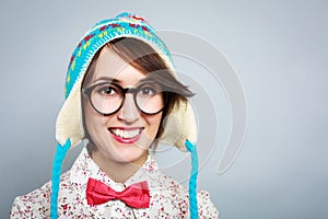 Portrait of Funny Hipster Girl in Winter Hat