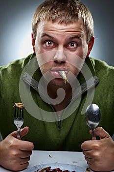 Portrait of funny hungry man