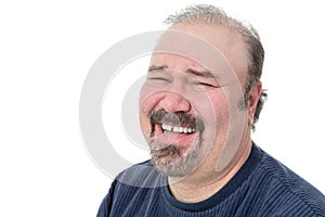 Portrait of a funny mature man laughing